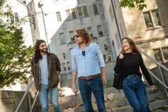 Three IU students walk on campus.